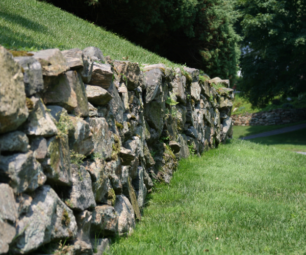 professional landscaping utah boulder retaining wall yard