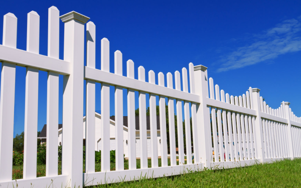 white fence in the yard - professional landscaping Utah